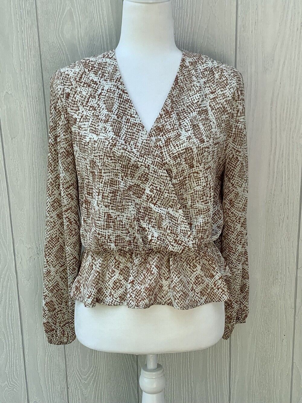 Free Press Clothing tan cream print v-neck blouse top size small